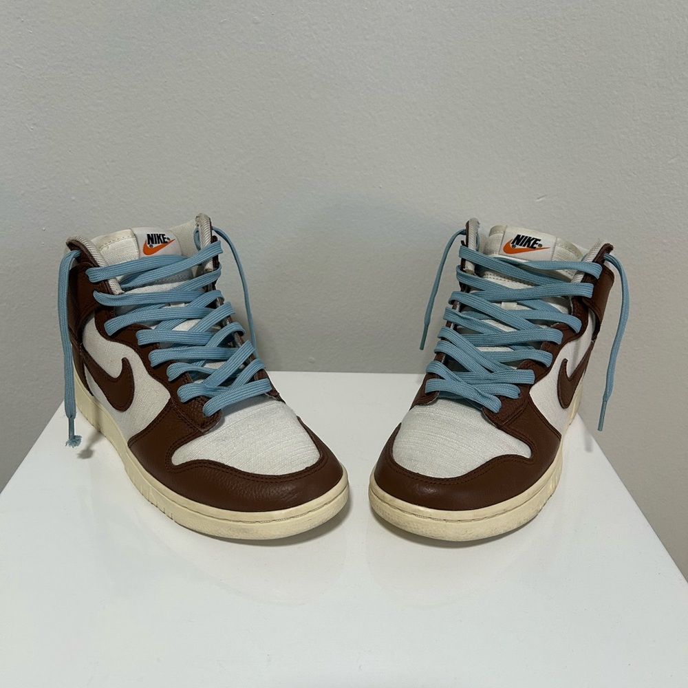 Nike High-Top Sneakers with Brown and Light Blue Accents